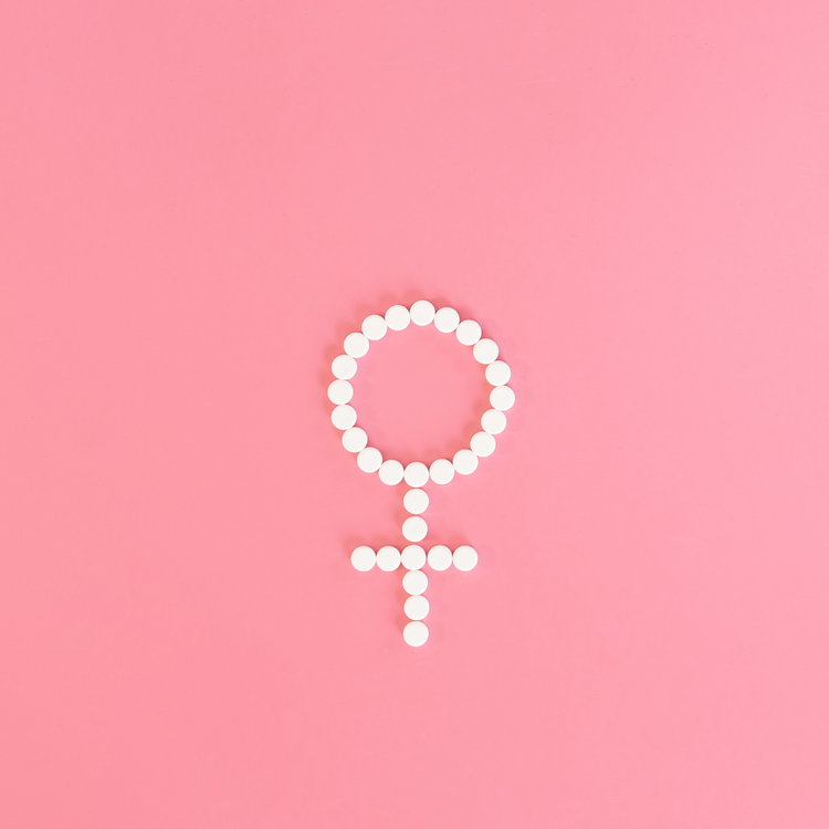 SUPLUS Feminine Vitality collection image with pink supplement bottles on a white background