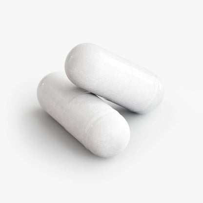 SUPLUS BIOTIC+ Probiotic Supplement White probiotic capsules arranged on a clean background